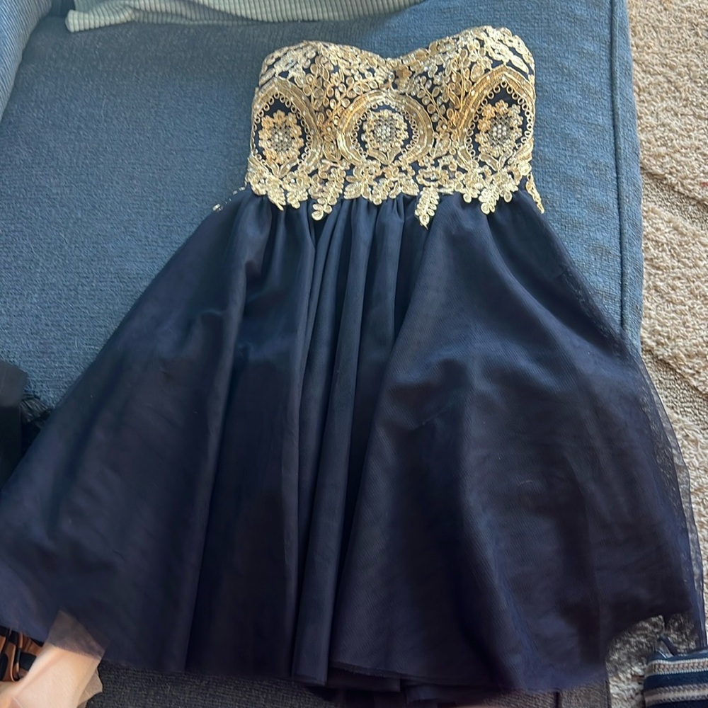 City Studio size 1 navy Prom dress with beautiful gold accents& tie in back